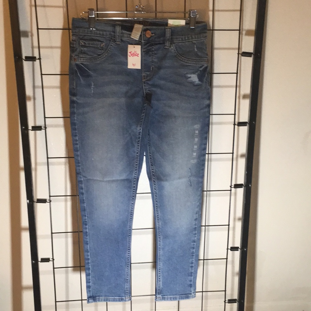 Medium wash justice button waist jegging